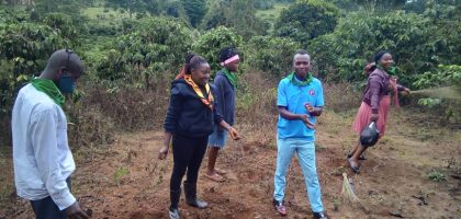 youth planting trees at Buyoga
